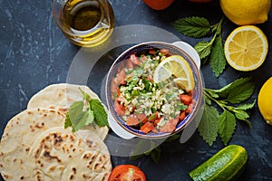 Lebanese tabbouleh salad with bulgur, parsley, tomato and cucmber