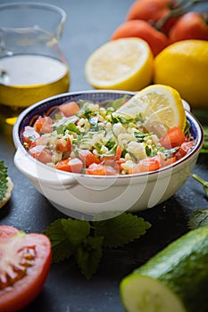 Lebanese tabbouleh salad with bulgur, parsley, tomato and cucmber