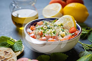 Lebanese tabbouleh salad with bulgur, parsley, tomato and cucmber