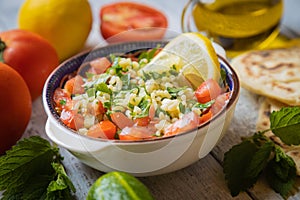 Lebanese tabbouleh salad with bulgur, parsley, tomato and cucmber