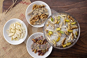 Lebanese traditional dessert meghli on a wooden table