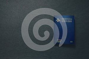 Lebanon Passport on dark background with copy space - 3D Illustration