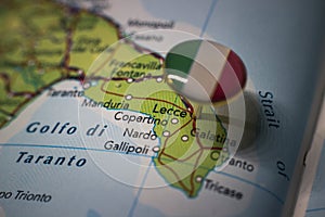 Lecce pinned on a map with the flag of Italy