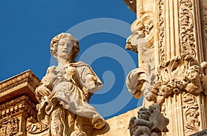 Lecce, Puglia, Italy. August 2021. The church of Santa Croce is the finest example of Lecce baroque. Detail of the facade