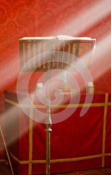 Lectern in altar with a holy bible.