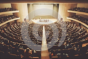 Lecture in a large university auditorium to a group of students aerial view. AI generated.