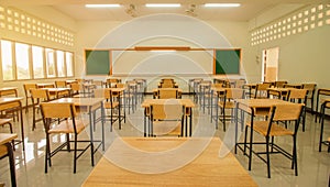 Lecture room or School empty classroom with desks and chair iron