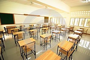 Lecture room or School empty classroom with desks and chair iron