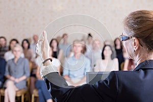 Lecturer giving floor to listener photo