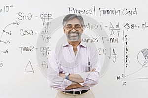 Lecturer Standing With Arms Crossed