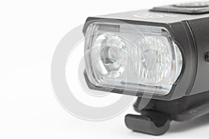 LED bicycle white front light isolated above white background with copy space