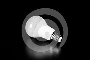 LED Bulb with Lighting on black background