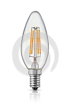 LED candle filament light bulb with e14 base isolated on white