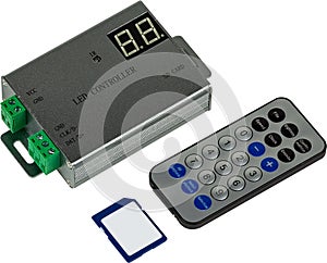 LED controller with remote control and memory card isolated on white background