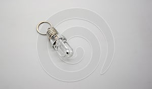 LED flashlight mini bulb with U shape keychain isolate on white