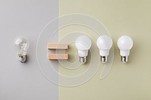Led and incandescent lightbulb compare top view. Energy saving, power efficiency and eco friendly concept
