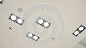 Led lamps and smoke safety and motion detectors on ceiling