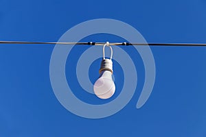 LED light blub in row on blue sky background
