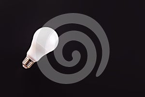 LED light bulbs on black color background. Levitation with copy space. Concept ecology, save planet earth, idea, save energy,