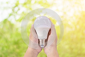 LED lighting bulb in hands