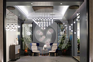 Led lighting and furniture in showroom Crystal chandelier photo