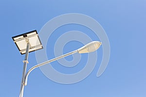 Led lighting and solar panel with blue sky background