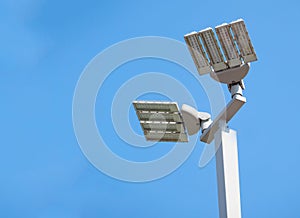 LED street lamps post on blue sky b