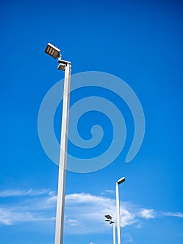 LED street lighting pole on blue sky background