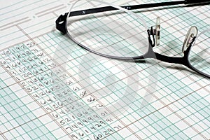 Ledger Paper and Glasses