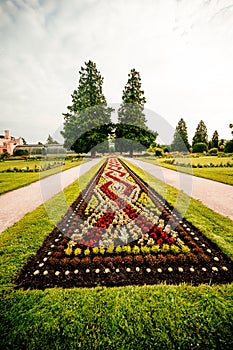 Lednice Chateau with beautiful gardens and parks. Lednice-Valtice Landscape, South Moravian region. UNESCO World Heritage Site.