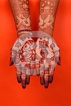 Ledy Feet and Hands in Heena for wedding in white background and isolated hand and feet  | hand design | feet design | beautiful d