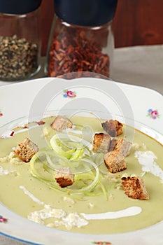 Leek and potato soup with garlic and croutons