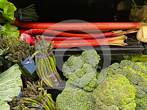 Leeks Broccoli and Asparagus on display in a grocery store