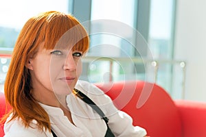 Leer red-haired girl photo