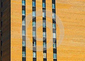 Left aligned windows in brick building backdrop