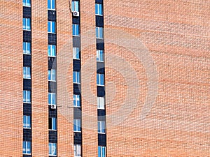 Left aligned windows in brick building backdrop