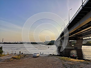 Left bank of the Dnipro river and bridge in Kyiv, Ukraine