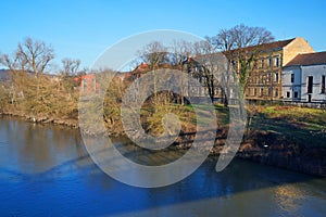 The left bank of the Mures river in early spring, seen from the iron bridge in Lipova.