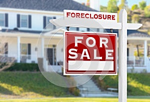 Left Facing Foreclosure For Sale Real Estate Sign in Front of House