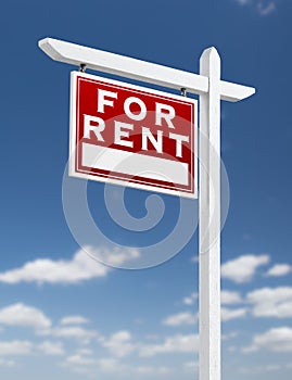 Left Facing For Rent Real Estate Sign on Blue Skies