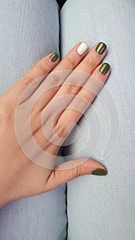 Left hand with green nails