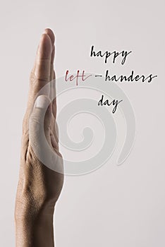 Left hand and text happy left-handers day photo