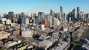 left pan aerial video view  of Seattle Downtown, with the Space Needle, Skyscraper and The Seattle Great Wheel