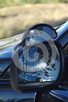 Left Rear View Mirror, sun reflection