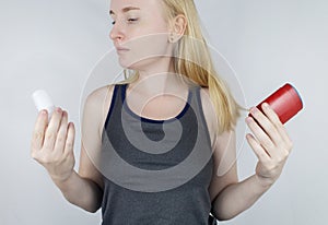 left or right. Girl chooses between eco-friendly deodorant without toxins and antiperspirant with toxic elements. In left hand photo