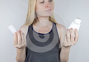 left or right. Girl chooses between eco-friendly deodorant without toxins and antiperspirant with toxic elements. In left hand photo