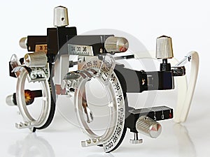 Left side view of trial frame used in ophtalmology and optometry to diagnose and correct refractive errors.