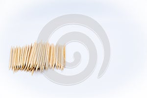 Left-sided toothpicks on white background photo