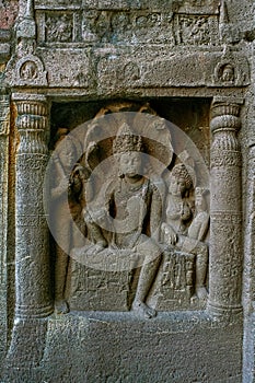 Left wing of faÃ§ade showing Nagaraja snake king and his consort nagini. Ajanta Caves,