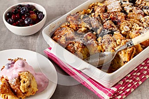 Leftovers bread pudding with nuts and berries